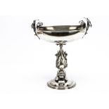 A 1960s silver centrepiece from Ball Black & Co, having oval bowl with scroll and lilies on stem