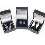 Three pairs of silver gilt and enamel Scandinavian earrings, two of floral design and one pair of