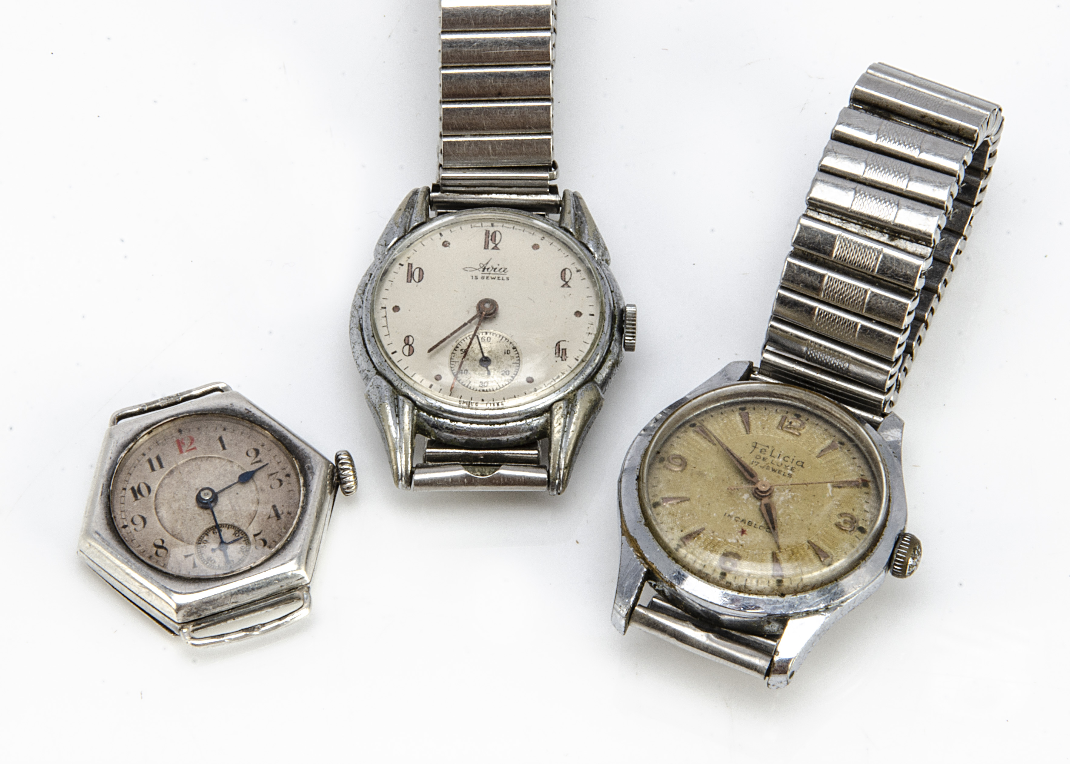 An Art Deco silver wristwatch head, 32mm hexagonal case, running, together with a mid-sized Avia and