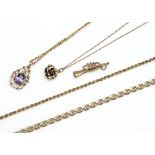 A quantity of 9ct gold, including a trumpet charm, a flattened curb link necklace, an amethyst