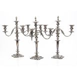 A set of late Victorian Sheffield plated candelabra, three candlesticks supporting two twin branch