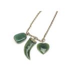 A 9ct gold nephrite and quartzite necklace, the belcher link supporting a heart, tusk and pebble