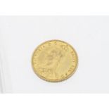 A Victorian gold two pound or double sovereign coin, dated 1887, small dents to rims otherwise VF-