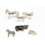 A collection of animal jewellery, including a 9ct gold horse's head, a silver and marcasite horse