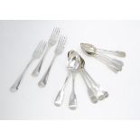 Twelve Georgian and later silver flatware items, including five dessert spoons, four teaspoons and