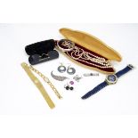 A small quantity of silver and watches, including a garnet tie slide, feather brooch, silver bangle,