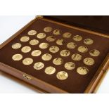 A set of 1970s Joannes Vermeer related silver gilt medallions, each medallion relating to the