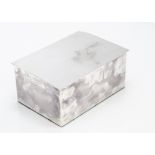 A modern silver cigarette box from Aquascutum, loose lid with dented corner, 15cm wide, on