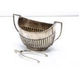 A late Victorian silver sugar basin by William Hutton & Sons, together with a pair of wishbone