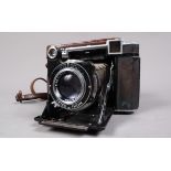 A Zeiss Ikon Super Ikonta 532/16 Folding Rangefinder Camera, serial no F5687, 6 x 6cm format, body