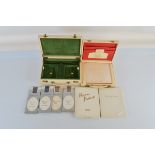 Two cream leather hinged boxes, one with green velvet fitted interior for jewellery with gilt