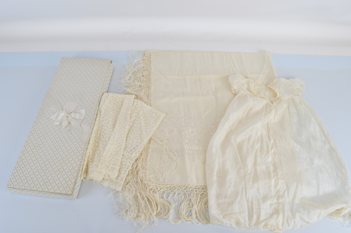 A Christening gown, with parachute silk slip and an embroidered shawl, with box.