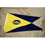 A Fyffe's Fresh Fruit and Vegetable Company flag, the burgee shaped flag with logo to front in