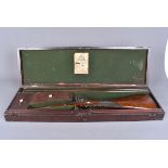 A 19th Century Westley Richards percussion cap double barrelled shotgun, with decoratively