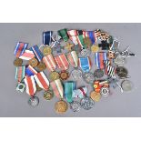 A large collection of British and Overseas medals, to include British WWII War, German Merit