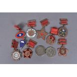 A small selection of Chinese medals, including a Paratroopers pin badge, together with the Chinese