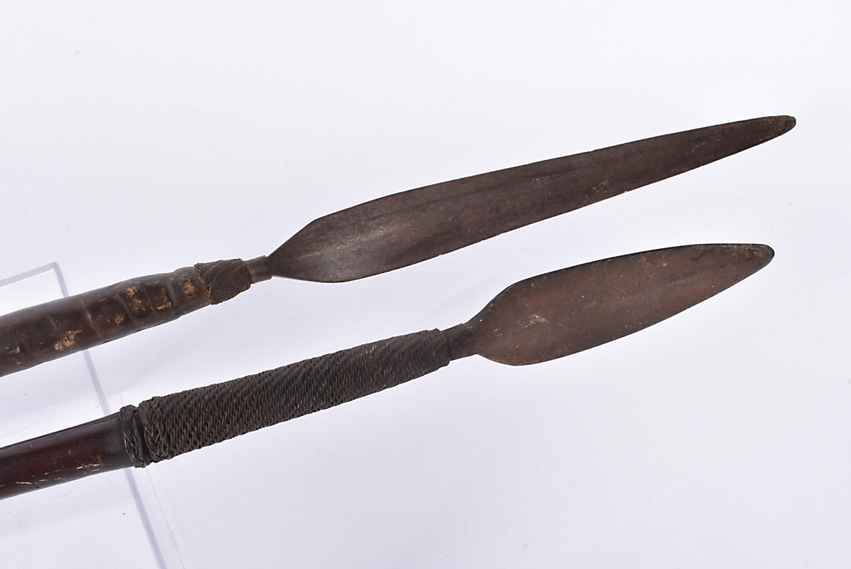 Two 19th Century Tribal spears, possibly Zulu, one with 31cm long head, with leather and wirework to