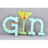A Mexican Industrial Pub Art sign, in the form of the word 'Gin', in turquoise and yellow, with