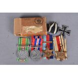 A WWII medal group, possibly Royal Air Force (RAF), comprising Defence, War, 1939-45 Star with North