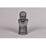 A Wedgwood Black Basalt bust of Sir Winston Churchill, modelled by Arnold Machin R.A, number 489,