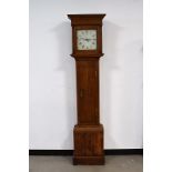 A light oak long case clock gun cabinet, the five gun cabinet built into the case of a long case