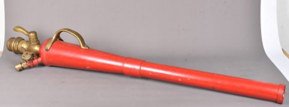A vintage Foam-making Branch pipe, possibly Pyrene, brass and red painted, approx. 130cm in length