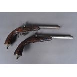 A pair of vintage Flobert pistols, with 25cm long octagonal barrel, with craved floral design to the