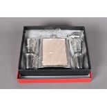 Five oversized drinking flask sets, unused, complete with four cups and a funnel, in fitted boxes (