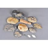Palaeolithic and Neolithic period, An assortment of flint and weaponary items, to include axe heads,