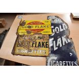 Three vintage Will's Gold Flake cigarette enamel advertising signs, all of different design and