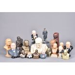 A collection of Churchill busts and figures, including a carved wooden example, with marks to the