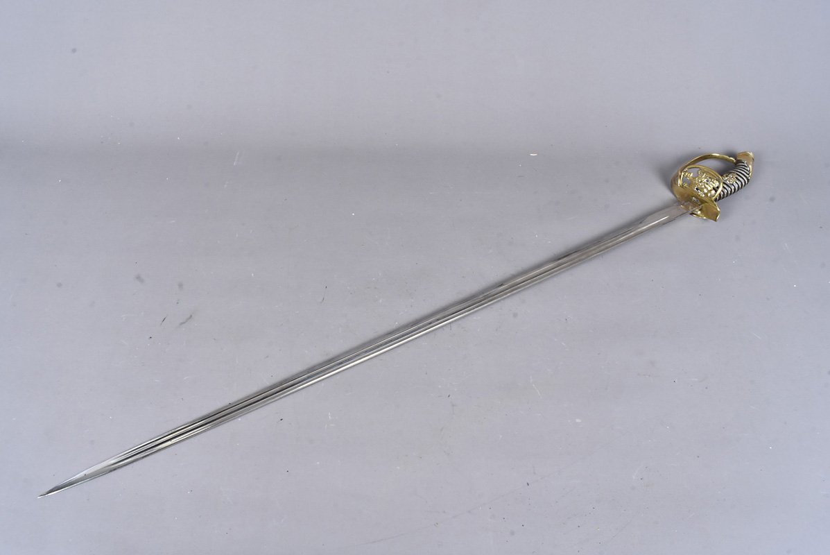 An Imperial German Officer's Sword by W.K & C, with gilt metal Royal Cipher cartouche to the grip,