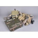 A WWII period gas mask, complete with breathing tube and filter, plus carry case, together with a