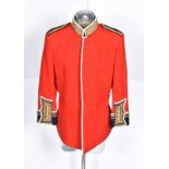 Two 1980s Irish Guards Red Ceremonial tunics, both made by Dege of Saville Row, both missing buttons