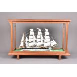 A cased model of a 20th Century Merchant Sailing model, the four-mast model in grey and red,