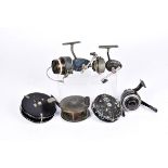 A small collection of fishing reels, to include a vintage brass example, with name, a Trudex, a