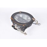 A Harley Aircraft Landing Light, model No.8ND, serial no.5210, complete in mount, 28.5cm diameter in