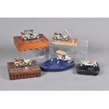 A collection of model car desktop tidies and other items, various wooden and ceramic examples (