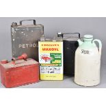 A collection of vintage petrol and oil cans, to include Pratts, a stoneware Stergene, Finnigan's