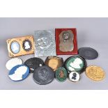 A collection of wall plaques and other items, to include a framed Wedgwood duo, a black basalt