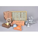 A collection of Winston Churchill related smoking items, to include a 1991 Zippo, cigar boxes, a