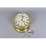 A Fattorini & Son Ltd brass ship's clock, with strike movement, with black Roman numerals on cream