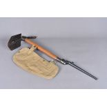 A WWII 1944 dated Entrenching Tool, date stamped to the wooden shaft and the metal base, with