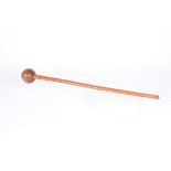 A 19th Century hardwood Knobkerrie, with 8cm diameter head, with 59cm long shaft, with split to