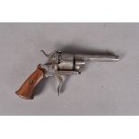 An Antique obsolete calibre pinfire revolver, with hexagonal barrel, six shot and fold away trigger,
