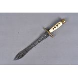A 17th/18th Century fighting dagger, possibly Italian with ivory handle, with brass pommel and cross