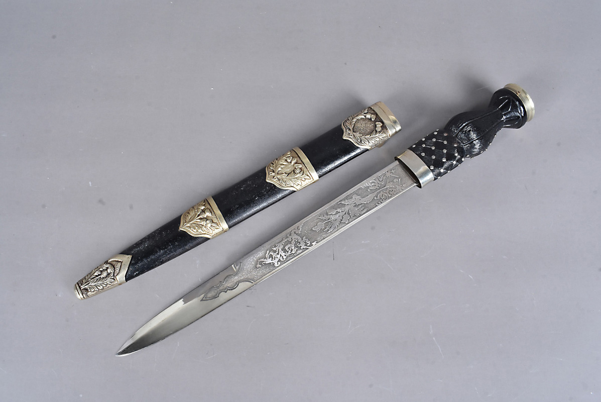 A Scottish Dirk, with 30cm long etched blade, with thistle decoration, possible marking to the