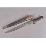 A Volunteer Metford and scabbard, the unmarked bayonet with 30cm long double edged blade, complete