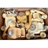A group of five cream rotary telephones, all with their recievers (parcel)