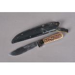 A Puma Forster-Nicker multi-purpose knife, with antler handle, with 11.5cm long blade, with